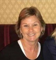 Portrait of happy female customer of EMF Neutralizer
