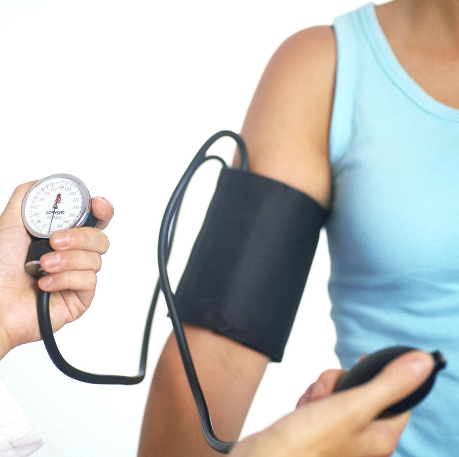 measuring-blood-pressure-cristina-pedrazzini Measuring blood pressure of patient
